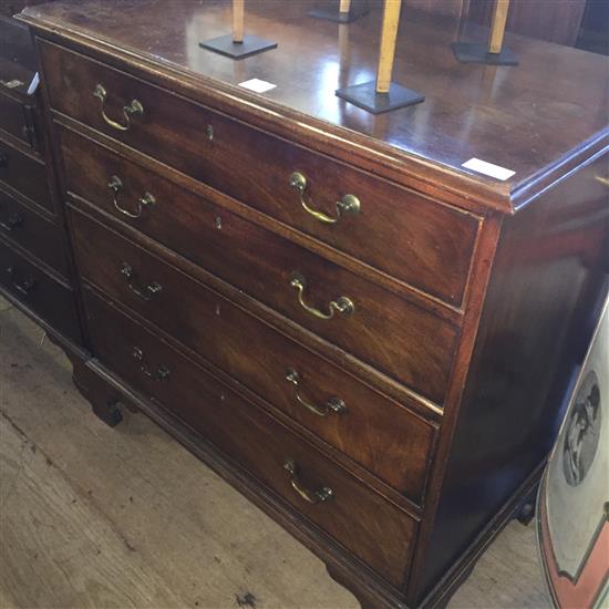 George III mahogany chest of four long drawers(-)